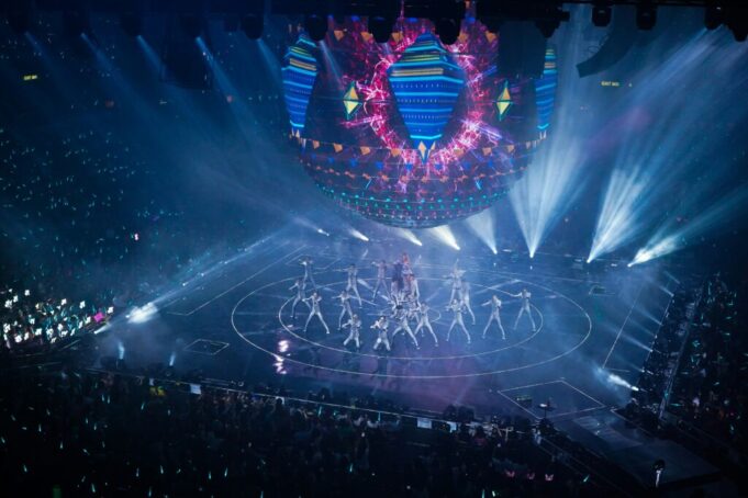 Singers perform on stage in front of live audience at Eurovision