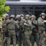 Dans Le Minnesota, Deux Éluslocaux et Leur Contheexhirtvisépar des Tirs: Deux Morts et deux Segens