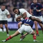 The All Blacks’ Sevu Reece is tackled by France’s Louis Bielle-Biarrey during the November 2024 international.